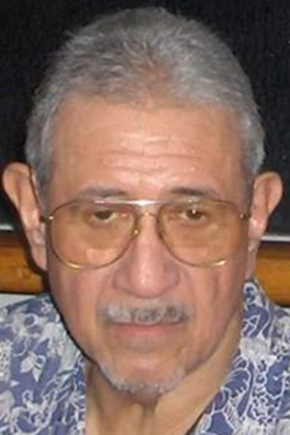Joseph Porter Umi Akau Jr. headshot.
